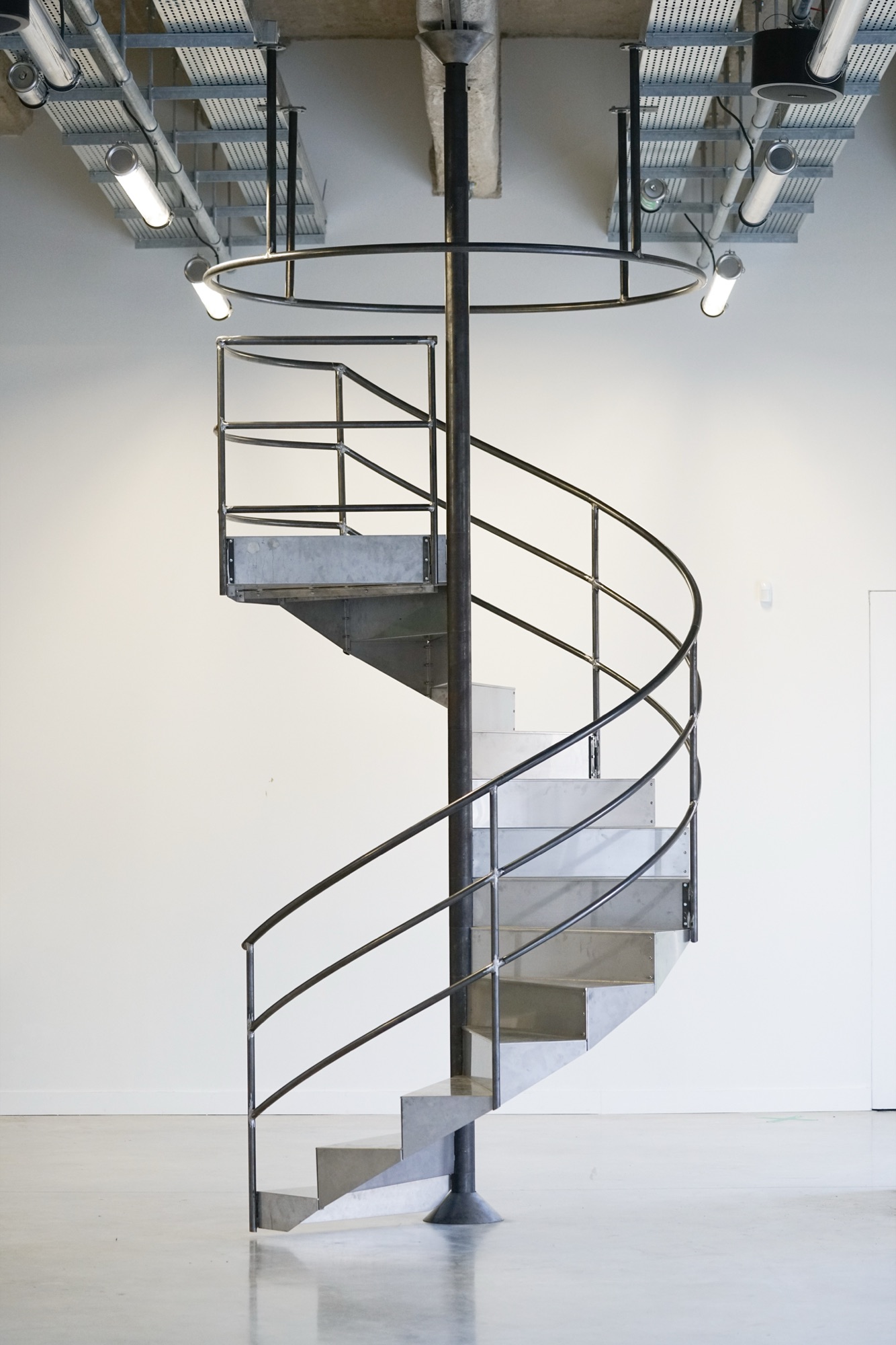 spinning staircase — staircase set into rotation by walking